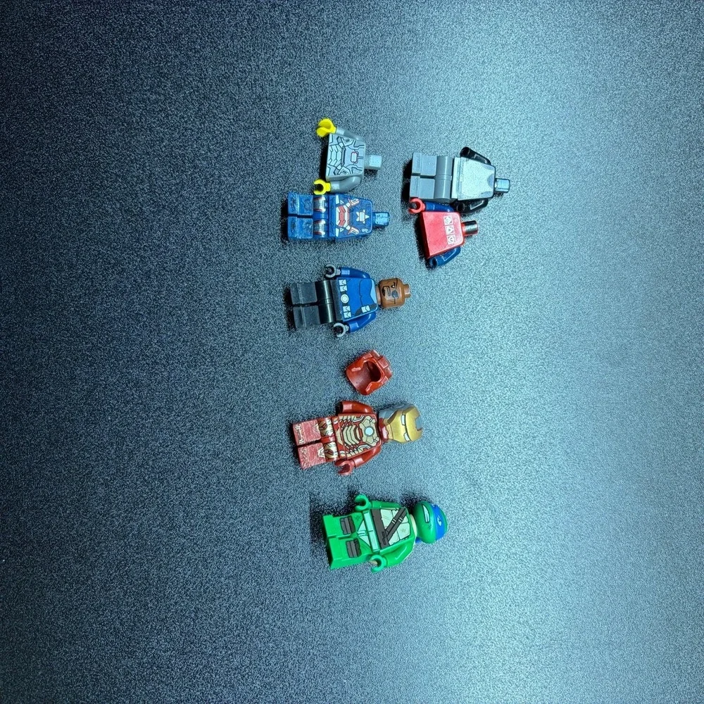 Lot of Lego Marvel, TMNT, Castle, and Gravity games minifigures some are parts